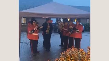 Military band plays for Daisy Nook Residents